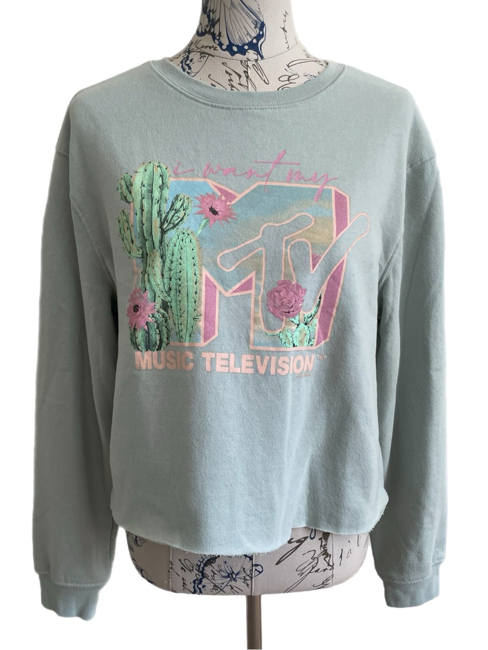 MTV Pastel Mint Green Graphic Crop Sweatshirt with Cactus Print